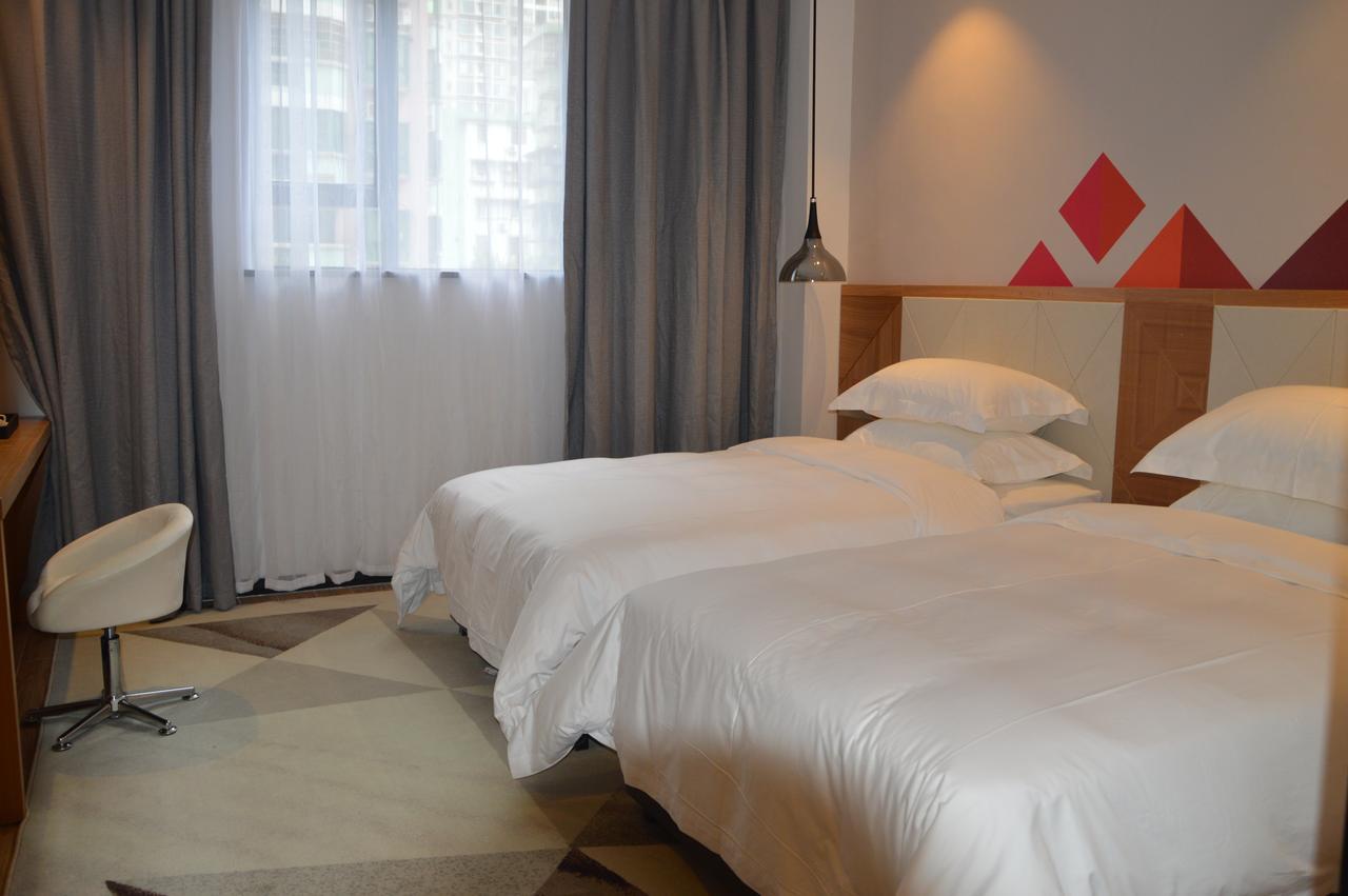 Borrman Hotel Guangzhou Tianhe Sports Center Экстерьер фото