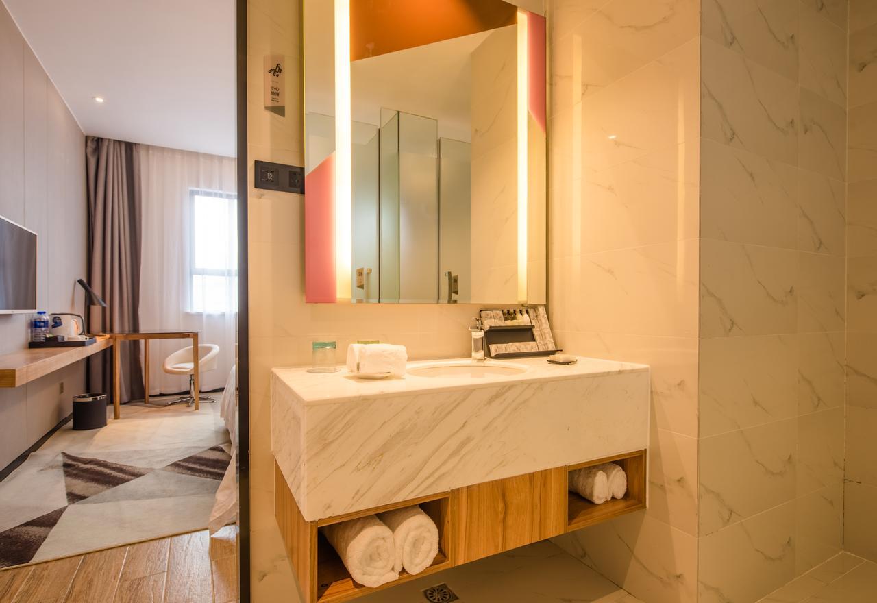 Borrman Hotel Guangzhou Tianhe Sports Center Экстерьер фото