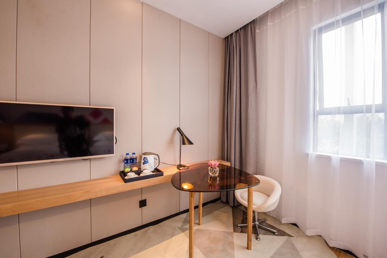 Borrman Hotel Guangzhou Tianhe Sports Center Экстерьер фото